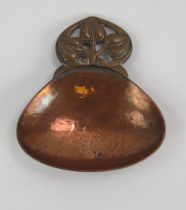 An Arts & Craft influence beaten copper tea caddy, by A. Edward Jones Ltd, with pierced foliate