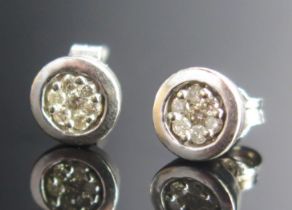 A Pair of 9ct White Gold and Diamond Stud Earrings, 7mm diam., hallmarked, 2.1g