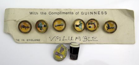 A Carded Set Of Guinness Buttons and two enamel badges