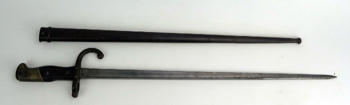 A 19th century French Chassepot bayonet with 52cm T-shaped blade, with curved quillion, and wood