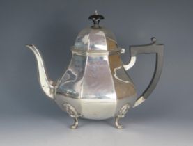 A George V silver teapot, maker's mark worn, Sheffield, 1926, of octagonal baluster form, with domed