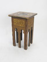 A Persian inlaid occasional table, the square top with inlaid mother-of-pearl script and floral