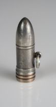 A novelty combination propelling pencil and seal in the form of a bullet by Mordan & Co, 3.5cm long.