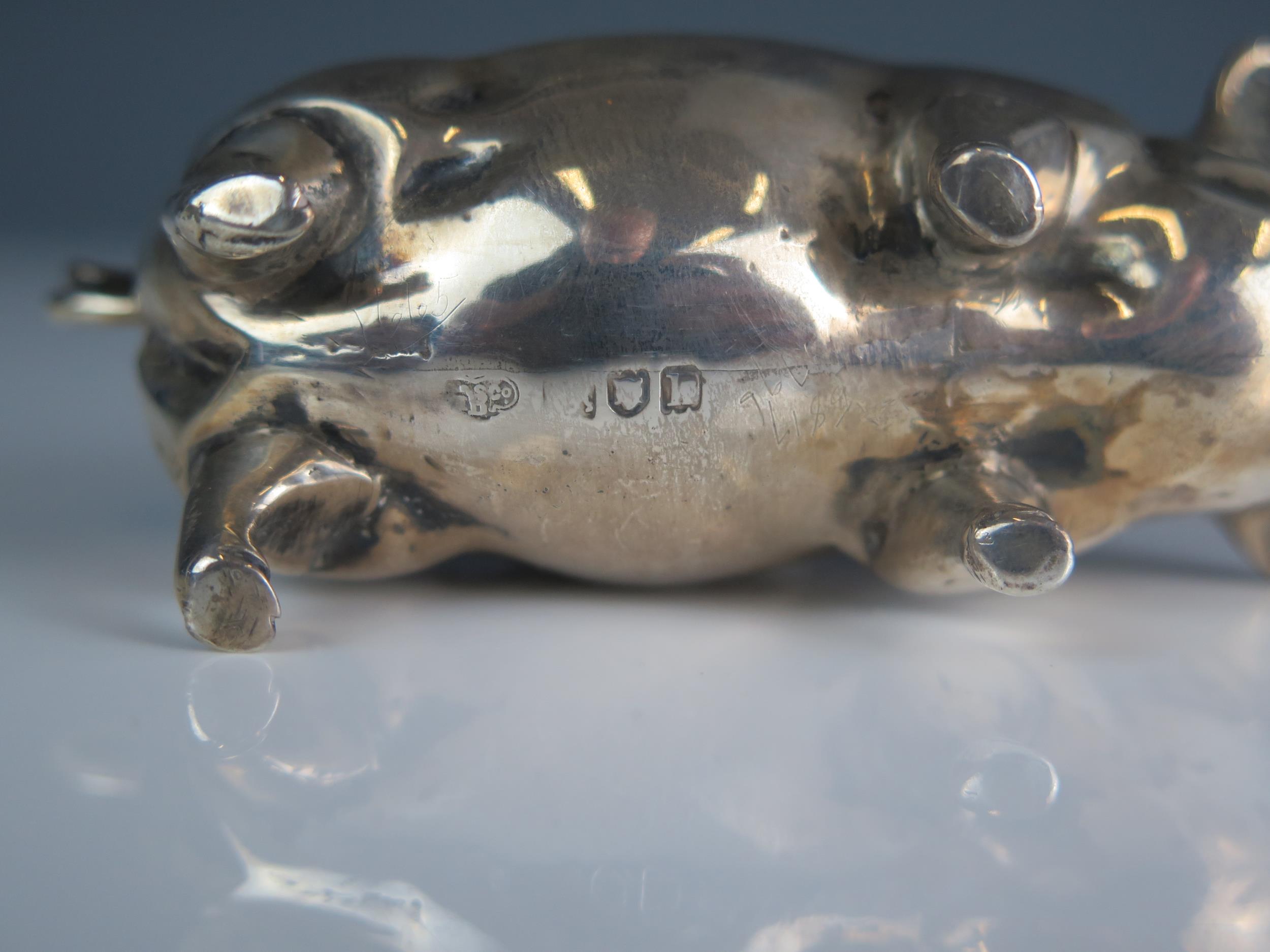An Edward VII novelty nib cleaner, maker's mark worn, London, 1905, in the form of a pig, 9cm long. - Image 2 of 2