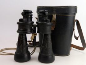A pair of Third Reich period binoculars, 7 x 50, serial No 461885, contained in a black stitched
