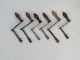 A collection of seven assorted telescopic table winding handles. (7).