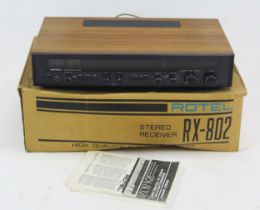 Rotel RX-802 AM/FM Stereo Receiver, teak cased with original box and owner's manual