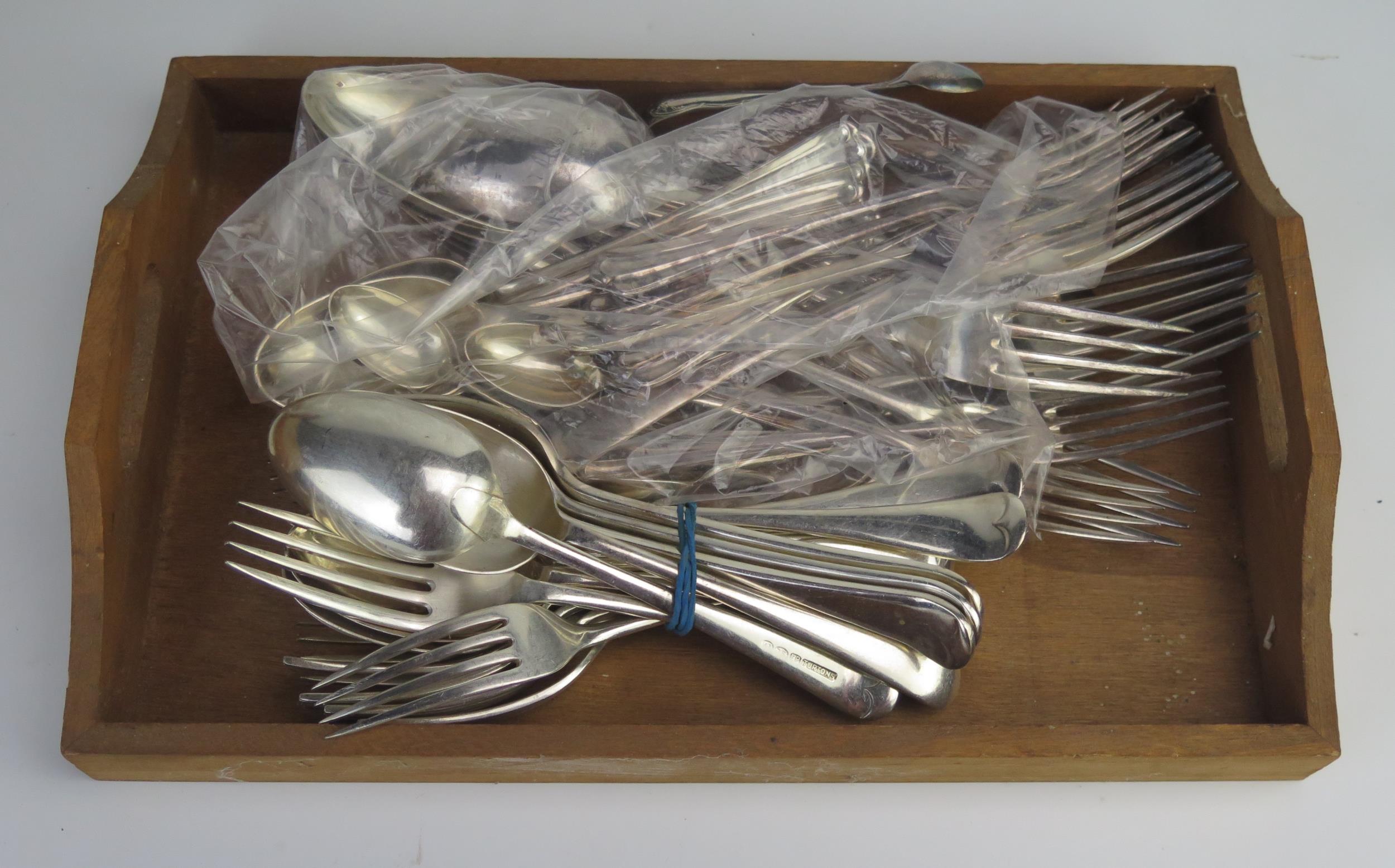 A collection of assorted plated flatwares includes table forks, dessert forks, dessert spoons, etc.
