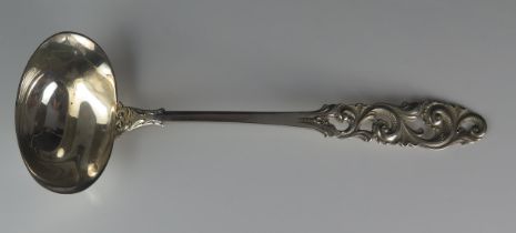 A Norwegian silver ladle, stamped marks, 830S for Brodrene Mylius, with oval-shaped bowl on a