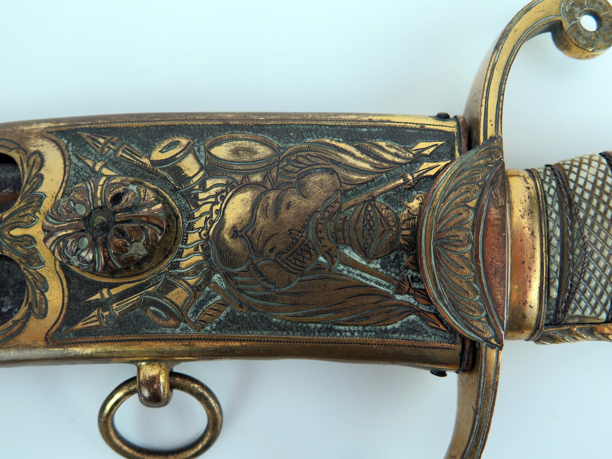 An early 19th century continental cutlass, with 44cm curved and etched blade, with gilt brass - Image 6 of 15