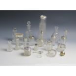 A collection of clear glass and silver mounted and plate mounted condiments and vases. (a lot).