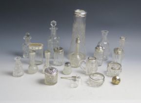 A collection of clear glass and silver mounted and plate mounted condiments and vases. (a lot).