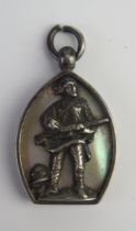 A South African War period silver pendant, inscribed to the reverse, the obverse with a 'Gentleman