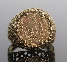 A 9ct Gold 'Coin' Ring, size N.5, hallmarked, 3.46g