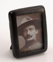 A Miniature Photographic Portrait of Baden-Powell (founder of the Scouts) on a silver easel back