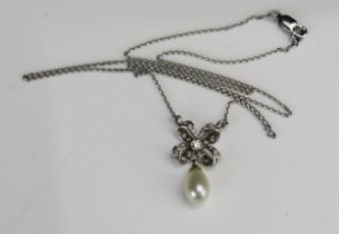 An 18ct Gold, Cultured Pearl and Diamond Necklace, 24.7mm drop and with a 17.75" (45cm) integral