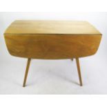 An Ercol Stripped Elm Kitchen Lap Table, 113(w)x 64-125(l)x72(h)cm