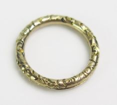 An Antique Precious Yellow Metal Jump Ring with foliate decoration, 18.1mm outer diam., KEE tests as