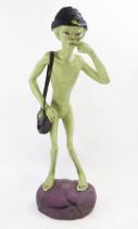 Life Size Alien Resin Figure with shoulder bag and hat decorated with yellow hemp, figures held to