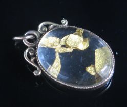 An Antique Gold 'Nugget' Pendant in a precious yellow metal mount, 34.3mm drop, KEE tests as 9ct,