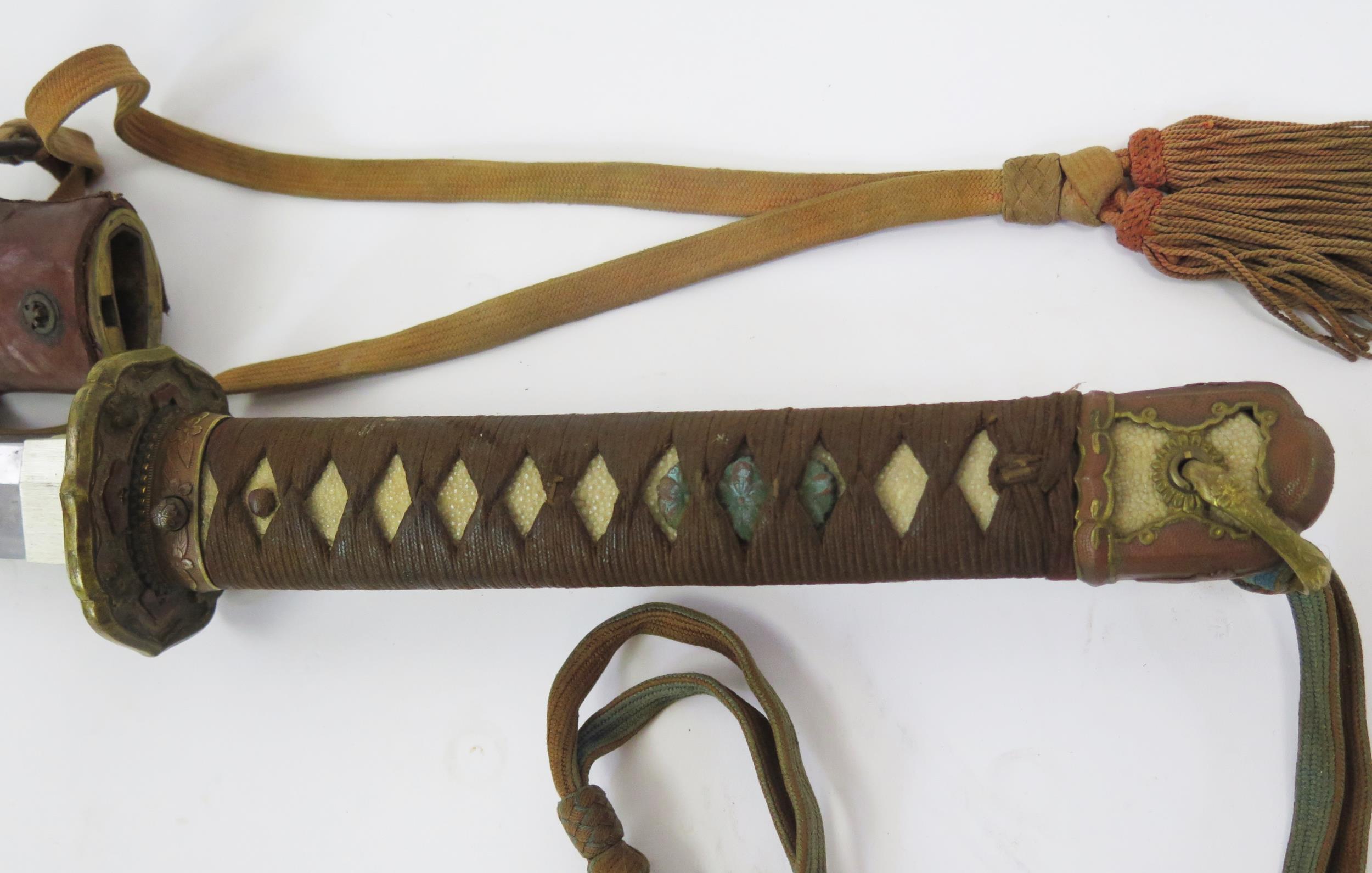 A Japanese World War II officers katana, with 63cm signed blade with bronze tsuba with cherry - Image 4 of 5