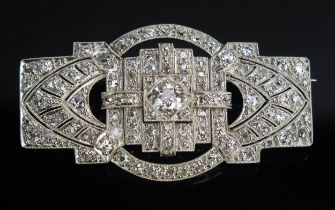 An Art Deco Diamond Brooch in an unmarked precious white metal setting, set with old cuts, largest