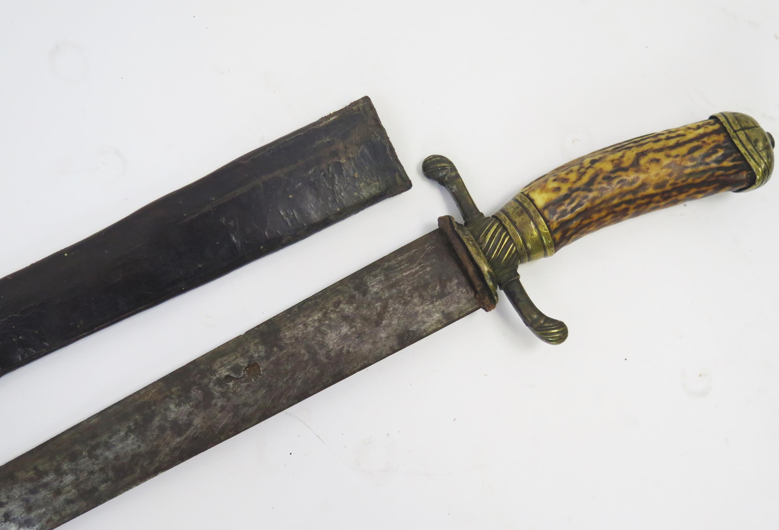 A 19th century continental hunting sword, with 64cm double edged blade, with brass cross guard, - Image 4 of 4