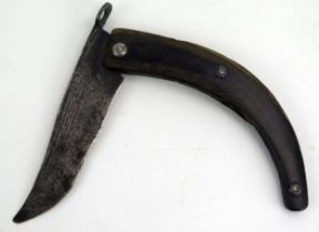 A Spanish Navaja knife, with 9cm single hinged, curved blade, with horn mounted grip, overall length