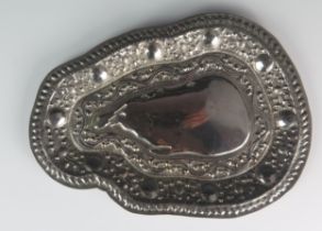 An Asian silver dish of shaped outline, with embossed banded decoration, 25.5cm long, 158gms, 5.