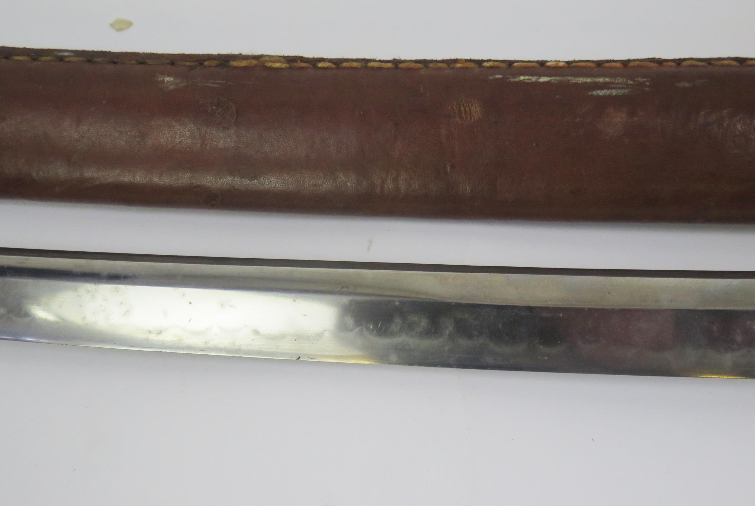 A Japanese World War II officers katana, with 63cm signed blade with bronze tsuba with cherry - Image 2 of 5