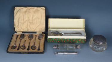 A mixed collection of silver wares including six coffee spoons, cased, preserve spoon, double