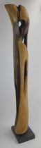 A Large Contemporary Carved Hardwood Figural Sculpture, signed to the base, WITOLD G KAWALEC and