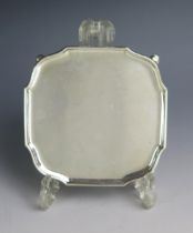 A George V silver waiter, maker Lambert & Co, Birmingham, 1915, of square outline, raised on swept