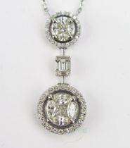 A Middle Eastern 18ct White Gold and Diamond Pendant on integral chain set with brilliant round,