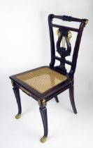 A 19th century Empire style mahogany salon chair, the back of tapering form with turned top rail