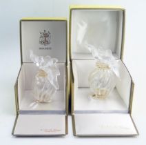 A Lalique for Nina Ricci 'Air du Temps, one 10.5cm (boxed) and one 11.5cm and stamped MADE IN FRANCE