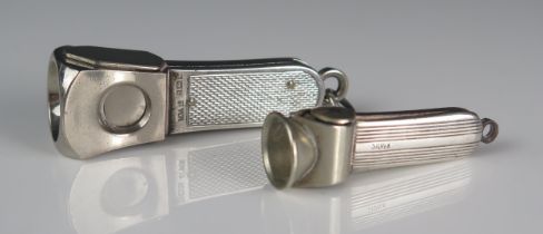 An Elizabeth II silver framed cigar cutter, maker W M Ltd, Birmingham, 1971, with engine turned