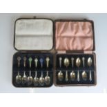 A set of six silver gilt coffee spoons, maker Josiah Williams & Co, London, 1939, cased, together