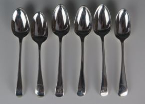 A matched set of six silver Old English pattern dessert spoons, various makers and dates, crested,