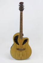 A Gear-4-Music six string electric acoustic guitar.