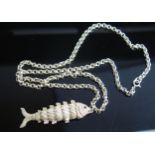 A Silver Articulated Fish Pendant, 81.9mm drop, hallmarked and on a 28" (70cm) chain, 74.1g