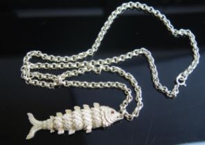 A Silver Articulated Fish Pendant, 81.9mm drop, hallmarked and on a 28" (70cm) chain, 74.1g