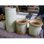 Three Terracotta Chimney Pots, 59cm and 32cm