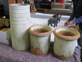 Three Terracotta Chimney Pots, 59cm and 32cm