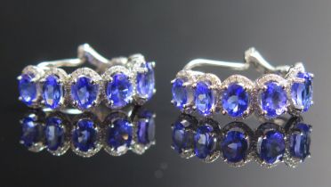 A Pair of 14ct Gold, Tanzanite and Diamond Earrings, c. 4.8x3.8mm stones, hallmarked, 5.63g