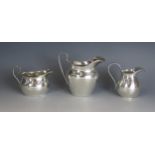 Three assorted silver cream jugs, various makers and dates, total weight of silver 223gms, 7.87ozs