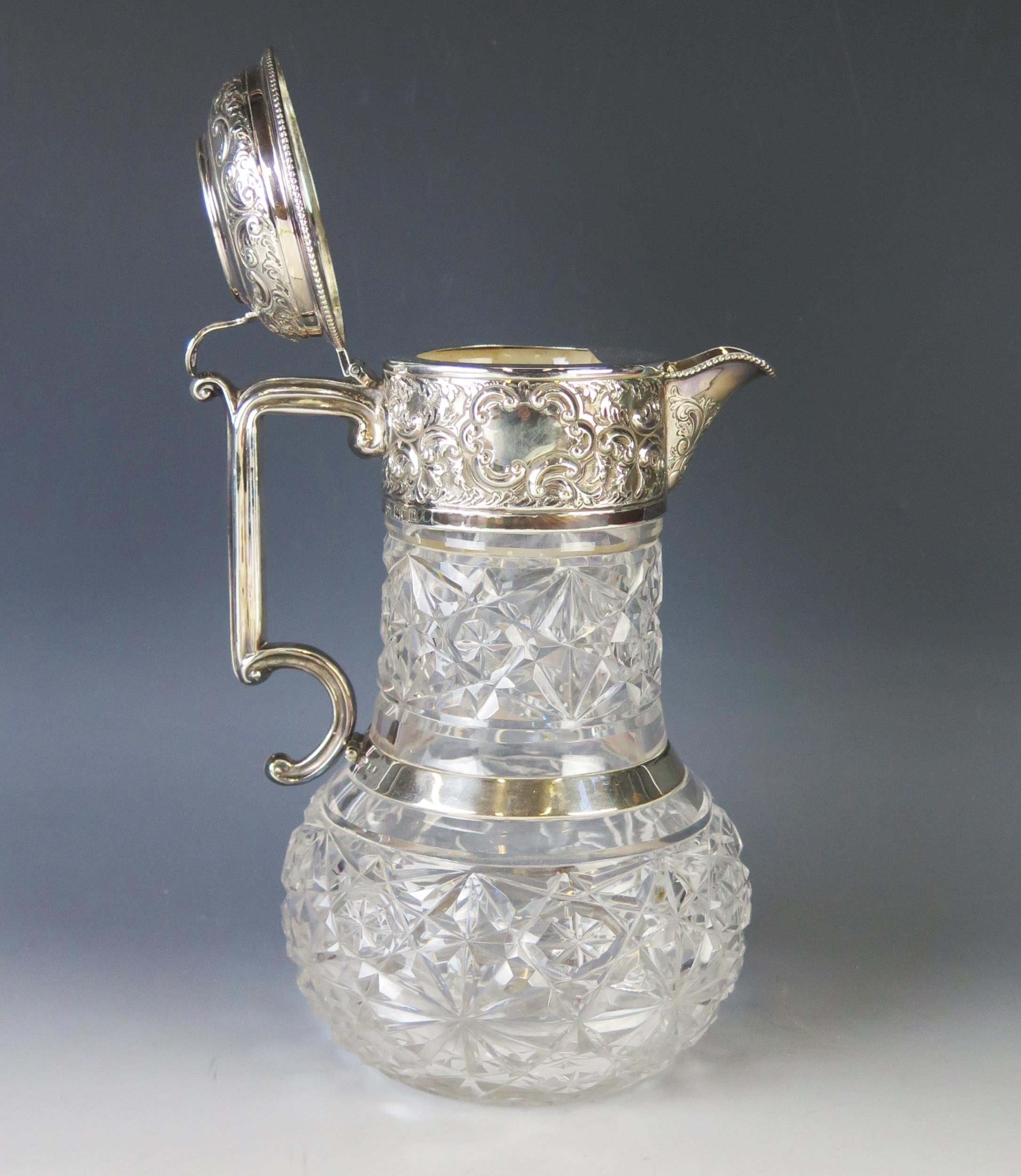 An Edward VII clear glass and silver mounted claret jug, maker Goldsmiths & Silversmiths Co Ltd, - Image 3 of 3