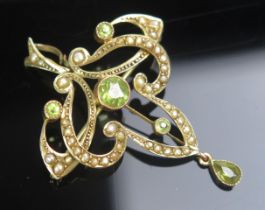 An Antique 9ct Gold, Peridot and Pearl or Cultured Pearl Pendant, 49.4mm drop, stamped 9CT H&W, 4.