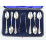 A set of six Edward VII silver tea spoons and matching tongs, maker Henry Williamson Ltd,