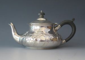 An Edward VII silver teapot, maker Edwin Dunthome, London, 1905, of squat circular form with